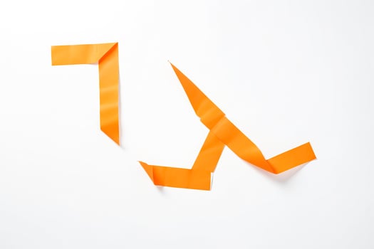 Orange ribbon on white background photo