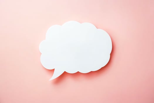 White Speech Bubble on Pink Background photo