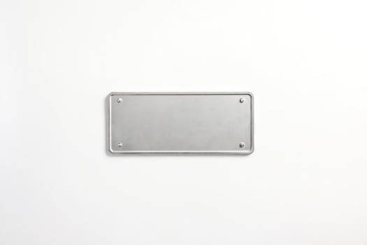Blank Metal Plate on White Background photo