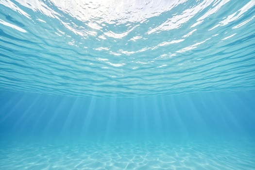 Underwater sunlight in blue water photo