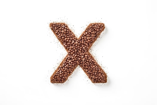 Coffee beans forming the letter X photo