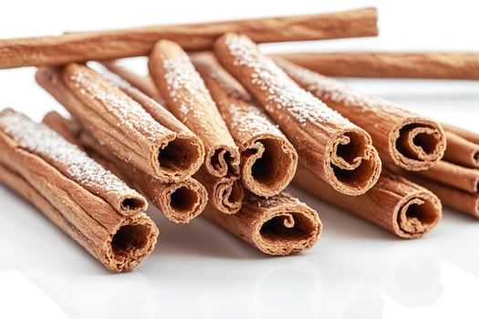 Close-up of Cinnamon Sticks with White Powder photo