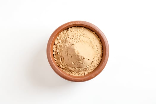 Brown powder in a bowl photo