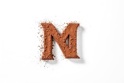 Cocoa Powder Letter M photo