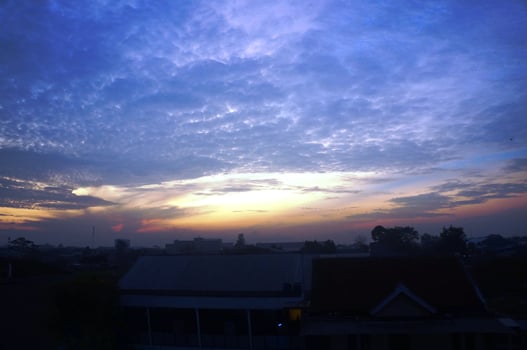 Dramatic morning or evening sky with unique cloud shapes photo