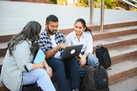 Cheerful Indian asian young group of college students or friends together photo