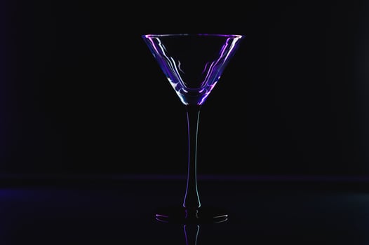 silhouette of martini glass on black background photo