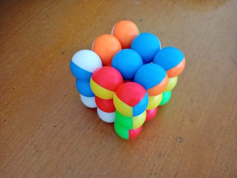 A colorful set of balls on a table photo
