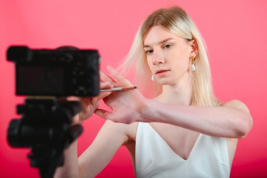 transgender posing isolated in studio. portrait of male model wearing make-up. photo