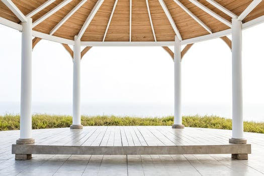 Empty Gazebo with Wood Ceiling and White Columns photo