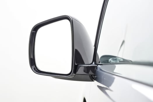Black Car Side Mirror on White Background photo