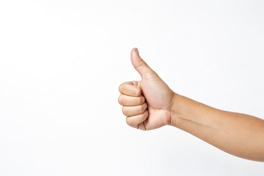 Thumbs Up Hand Gesture on White Background photo