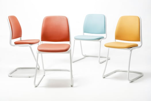 Four Modern Chairs in Different Colors photo