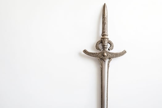 Ornate Silver Dagger on White Background photo