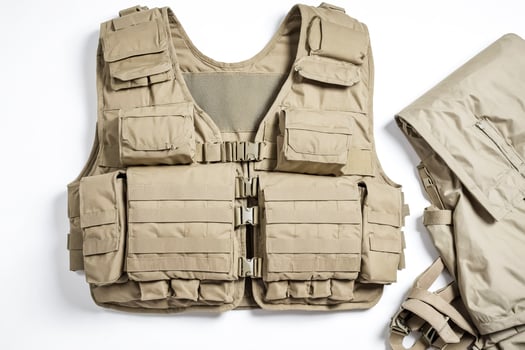 Tan Tactical Vest with Multiple Pockets and Straps photo