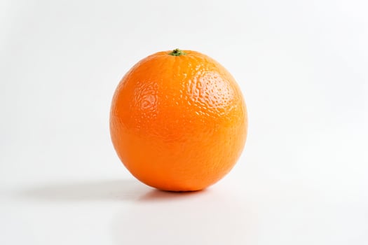 Single Orange on White Background photo