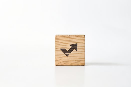 Wooden block with upward arrow symbol photo