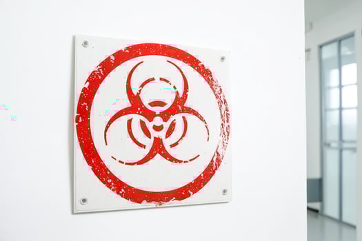 Biohazard Symbol Sign On White Wall photo