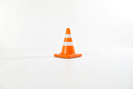 Orange Traffic Cone on White Background photo