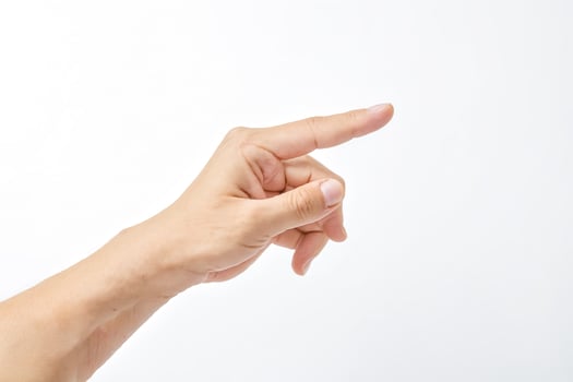 Hand pointing finger isolated on white background photo