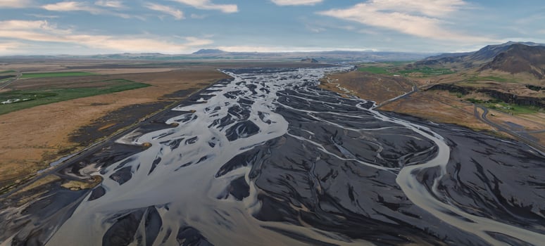 Aerial View of Winding River in Barren Icelandic Landscape photo