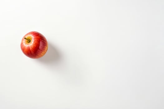 Red Apple on a White Background photo