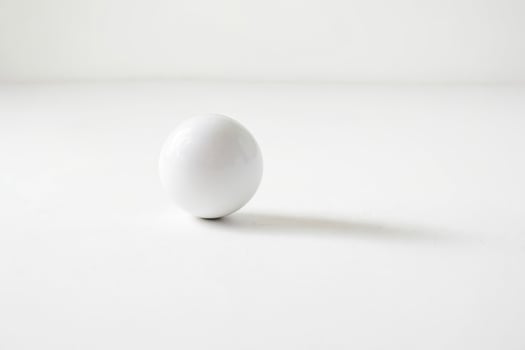 White sphere on white background photo