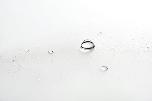 Single Water Drop on White Background photo