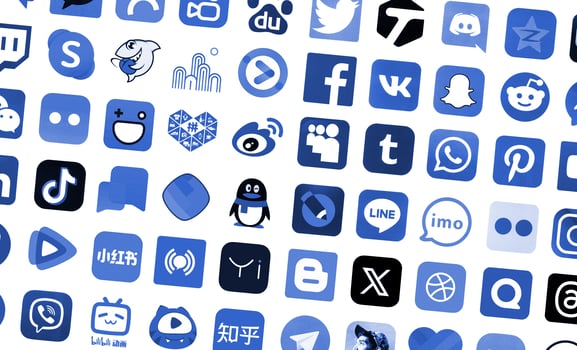 KYIV, UKRAINE - APRIL 1, 2024 Many icons of social media, messengers, sharing platforms photo