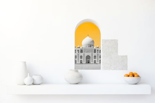 White Vase and Bowl with Oranges Against a Wall with an Arched Window Showing an Islamic Building photo