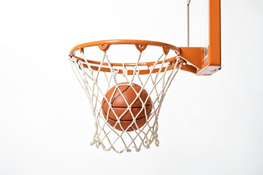 Basketball in a hoop isolated on white background photo