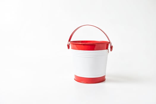 Red and White Metal Bucket on a White Background photo