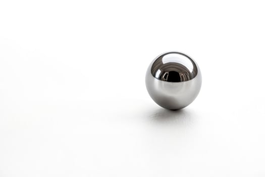 Silver Metal Sphere on White Background photo