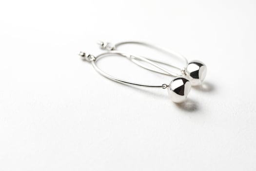 Silver Hoop Earrings with Sphere Charm photo