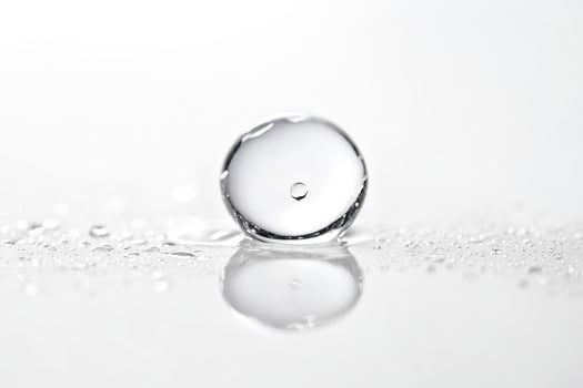 Clear Glass Sphere on Wet Surface photo