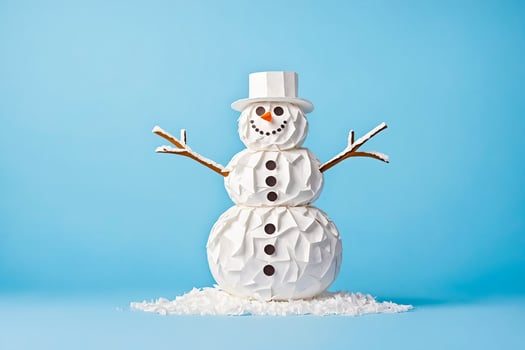 Paper Snowman on a Blue Background photo