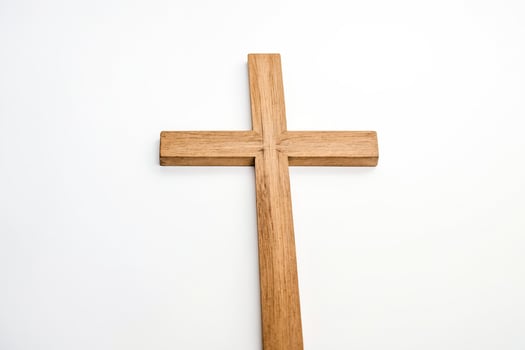 Wooden Cross on White Background photo