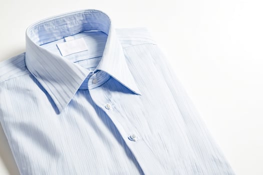 Close up of a light blue striped dress shirt photo