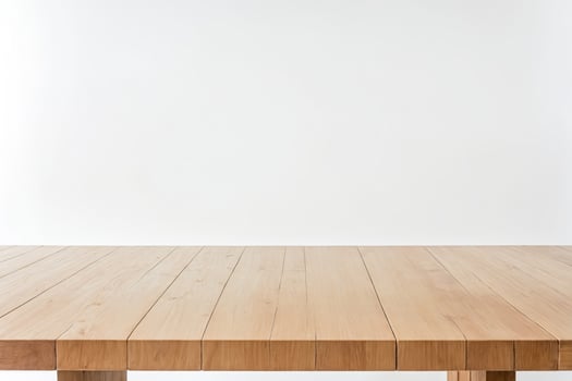 Wooden Table Against White Wall photo