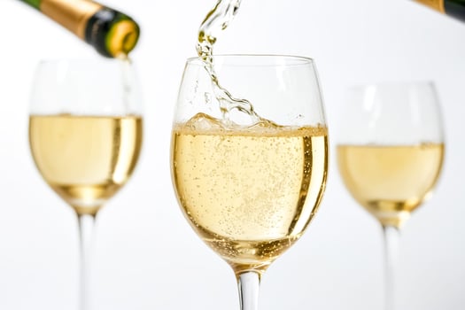 Champagne Pour on white background photo