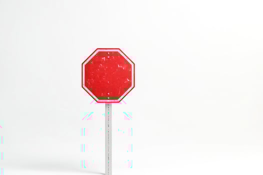 Red Stop Sign on White Background photo