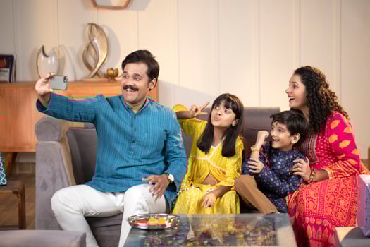 Joyful Parents Taking Selfies With Children photo