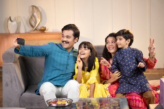 Dad Mother And Kids Posing While Taking Selfie photo