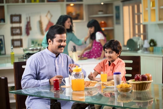 Father and Son Having Breakfast Together photo