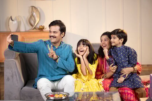 Father Mother Taking Selfie Or Self Photograph At Home With Kids photo