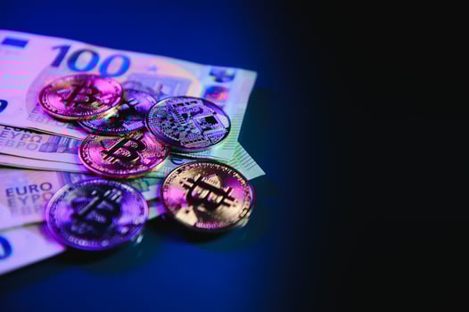 Golden bitcoin over Euro money. Bitcoin cryptocurrency. Crypto currency concept. Bitcoin with euro bills. Bitcoins stacked on euro banknotes photo