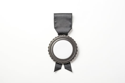 Black ribbon with a silver round frame on a white background photo