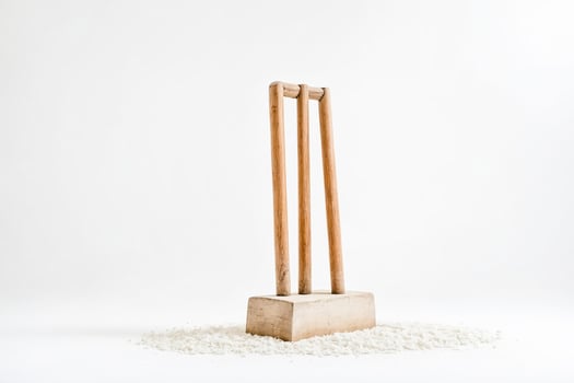 Wooden Cricket Wickets on White Background photo