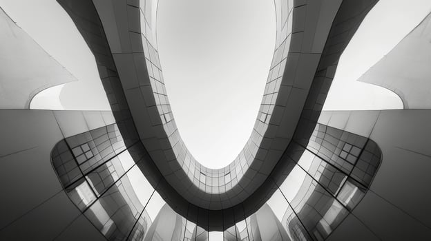 A symmetrical composition of bold curves and sharp angles highlights the precision and intricacy of a modern buildingsart.chitectural details. Black and white art. photo