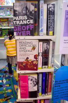 New Delhi, India, June 25 2024 - Variety of Books on shelf inside a book-stall at Delhi International Book Fair, Selection of books on display in Annual Book Fair at Bharat Mandapam complex photo